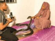 Woman who makes Ksh 10 million per month through a snake she has kept in the house